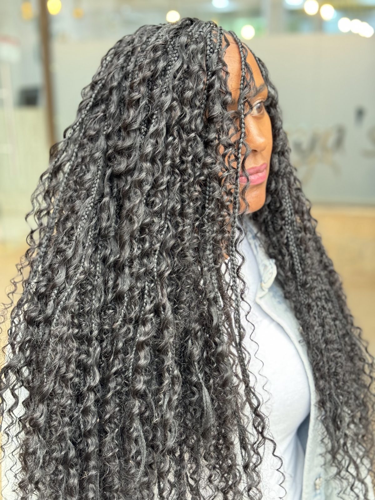 Long boho river locs styled at Maya's Salon